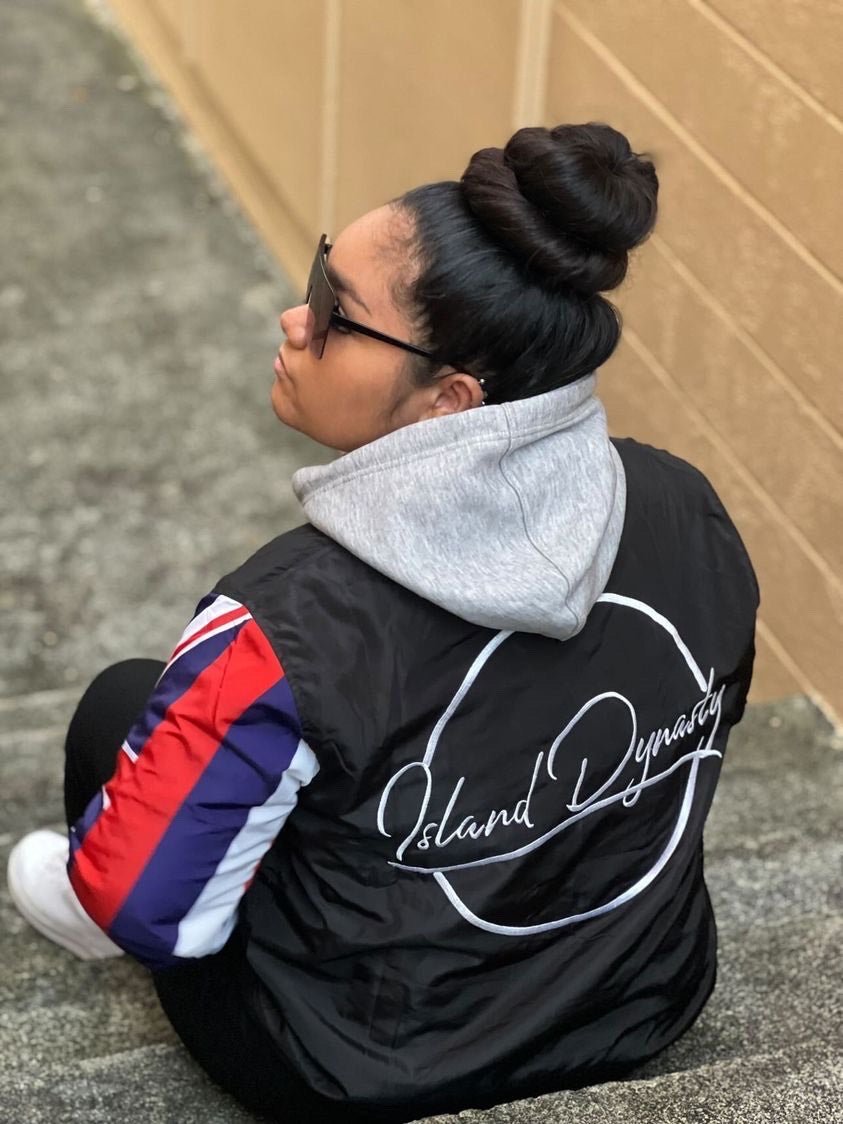 Island Dynasty Hawaiian Windbreaker - Island Dyansty Apparel OuterwearWoman Model showing the embroidered Island Dynasty Logo on the Island Dynasty Hawaiian Flag Windbreaker