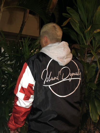 Island Dynasty Tongan Flag Windbreaker - Island Dyansty Apparel OuterwearBack and left side view of the Island Dynasty Tongan Flag Windbreaker displaying the embroidered Island Dynasty logo and back of the left sleeve showing the Tongan Flag